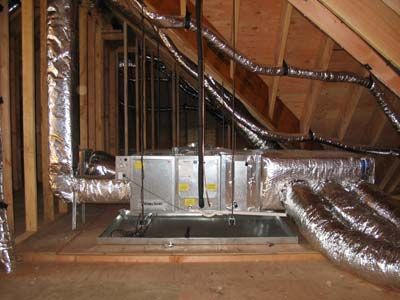 A room with a lot of pipes coming out of it.