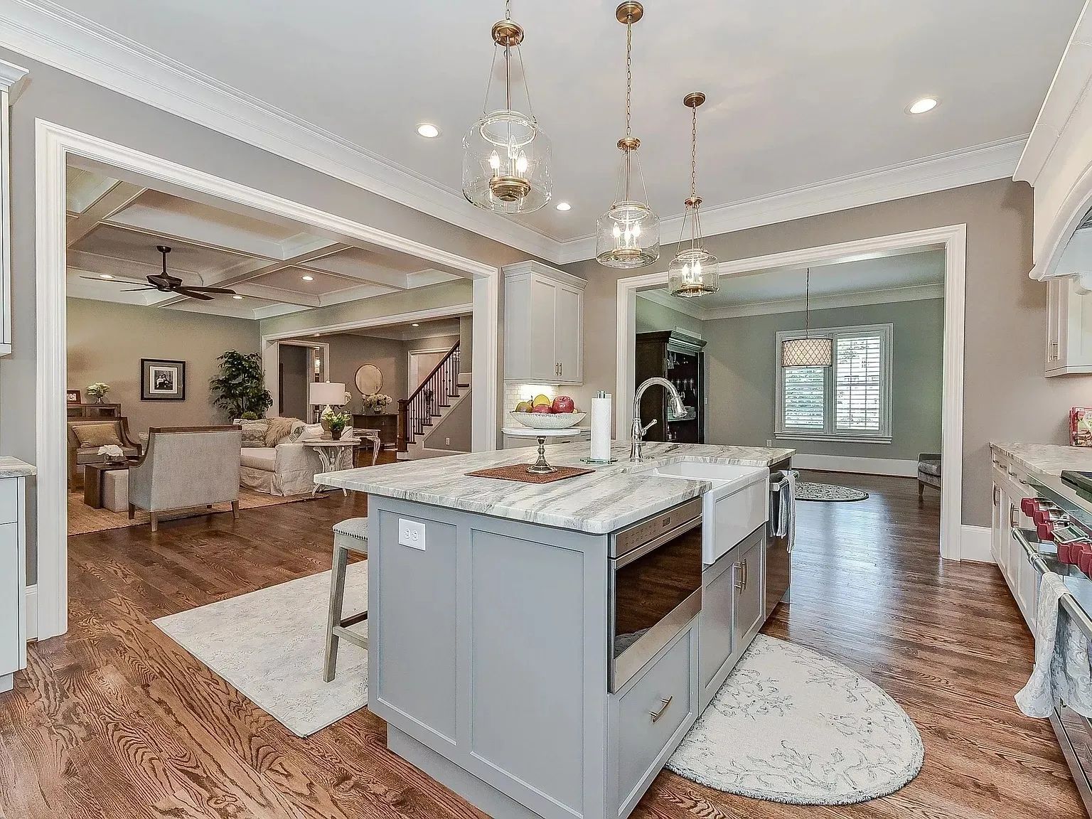 There is a large island in the middle of the kitchen.