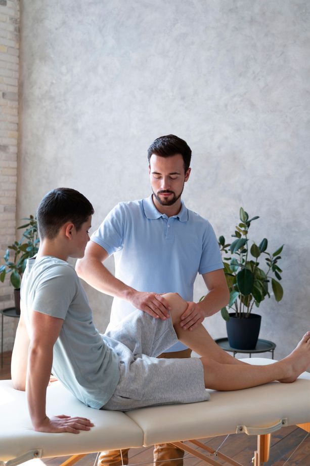 male therapist assessing the patient