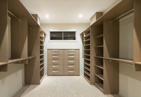 A Walk In Closet With Lots Of Shelves And Drawers — North Coast Cabinetmaking Pty Ltd In Cannonvale, QLD