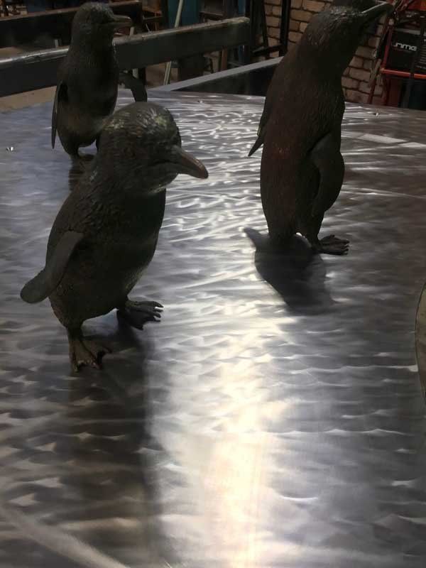 little iron penquins