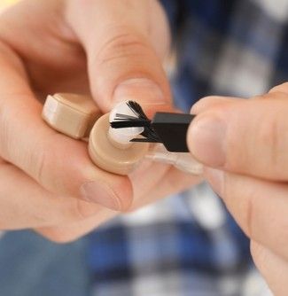 putting hearing aid