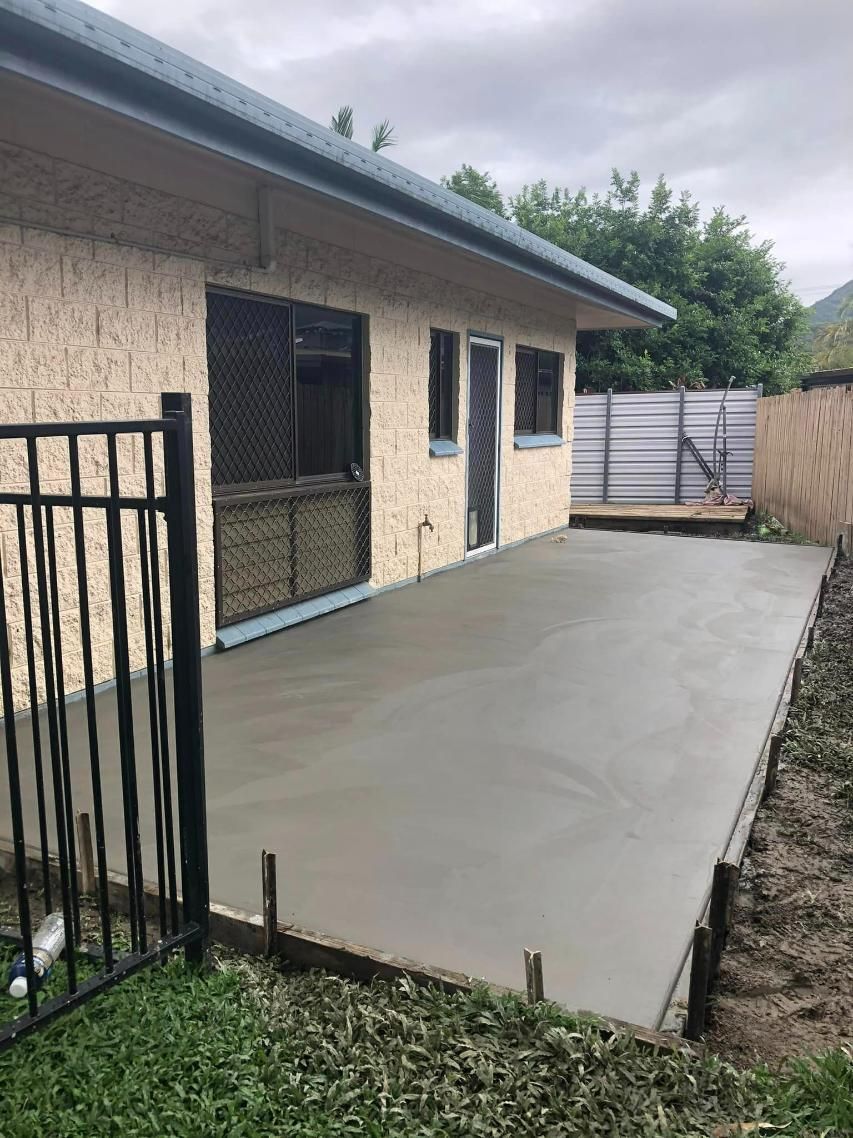 A Concrete Patio Is Being Built In Front Of A House — Value Concreting In Gordonvale, QLD