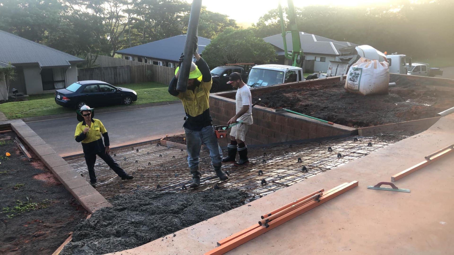 Construction Workers Pouring Concrete — Value Concreting In Mission Beach, QLD