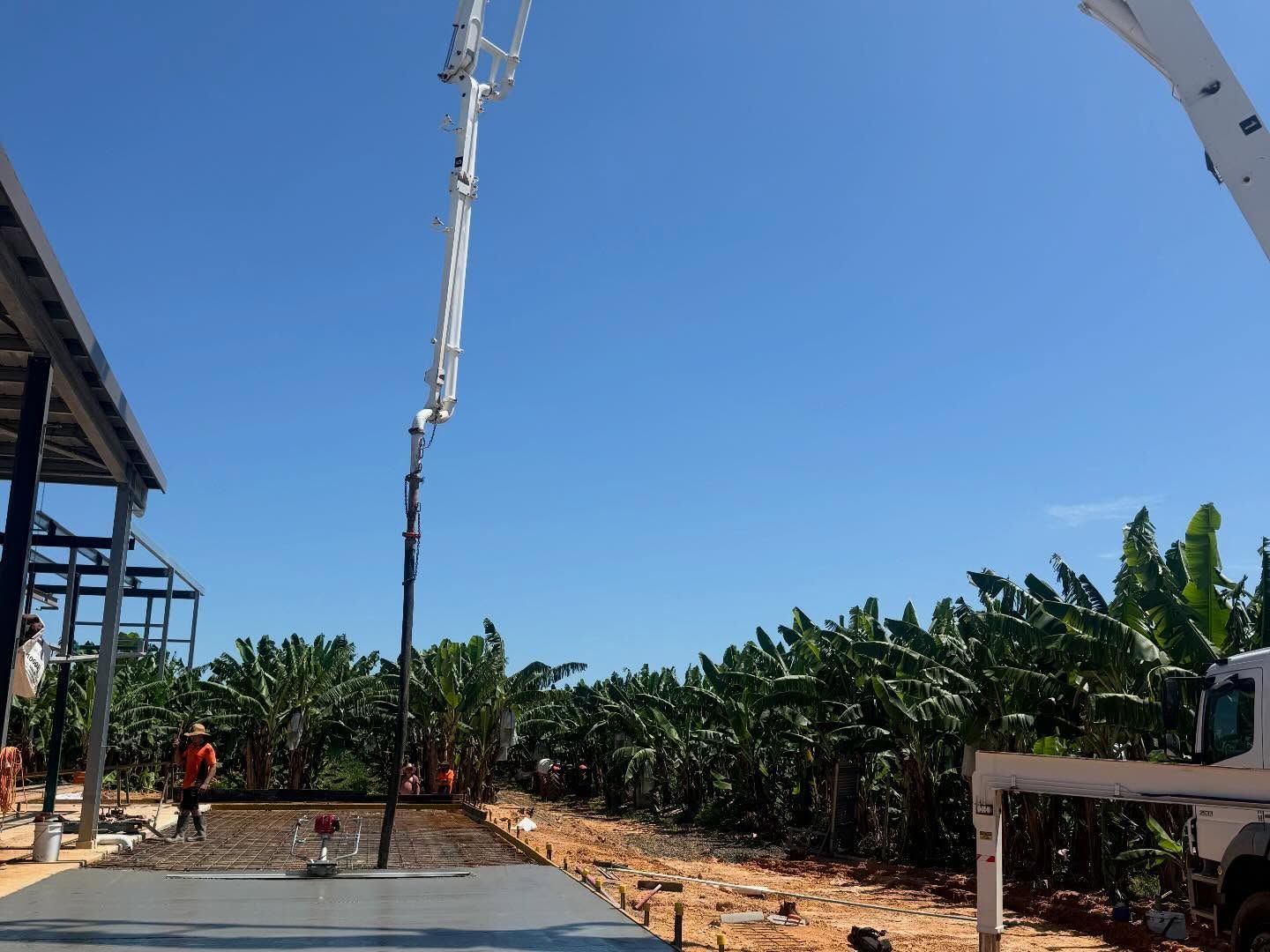 Concrete Being Poured From a Boom Pump — Value Concreting In Mission Beach, QLD