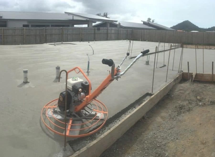 Orange Power Trowel Smoothing Wet Concrete Slab — Value Concreting In Innisfail, QLD