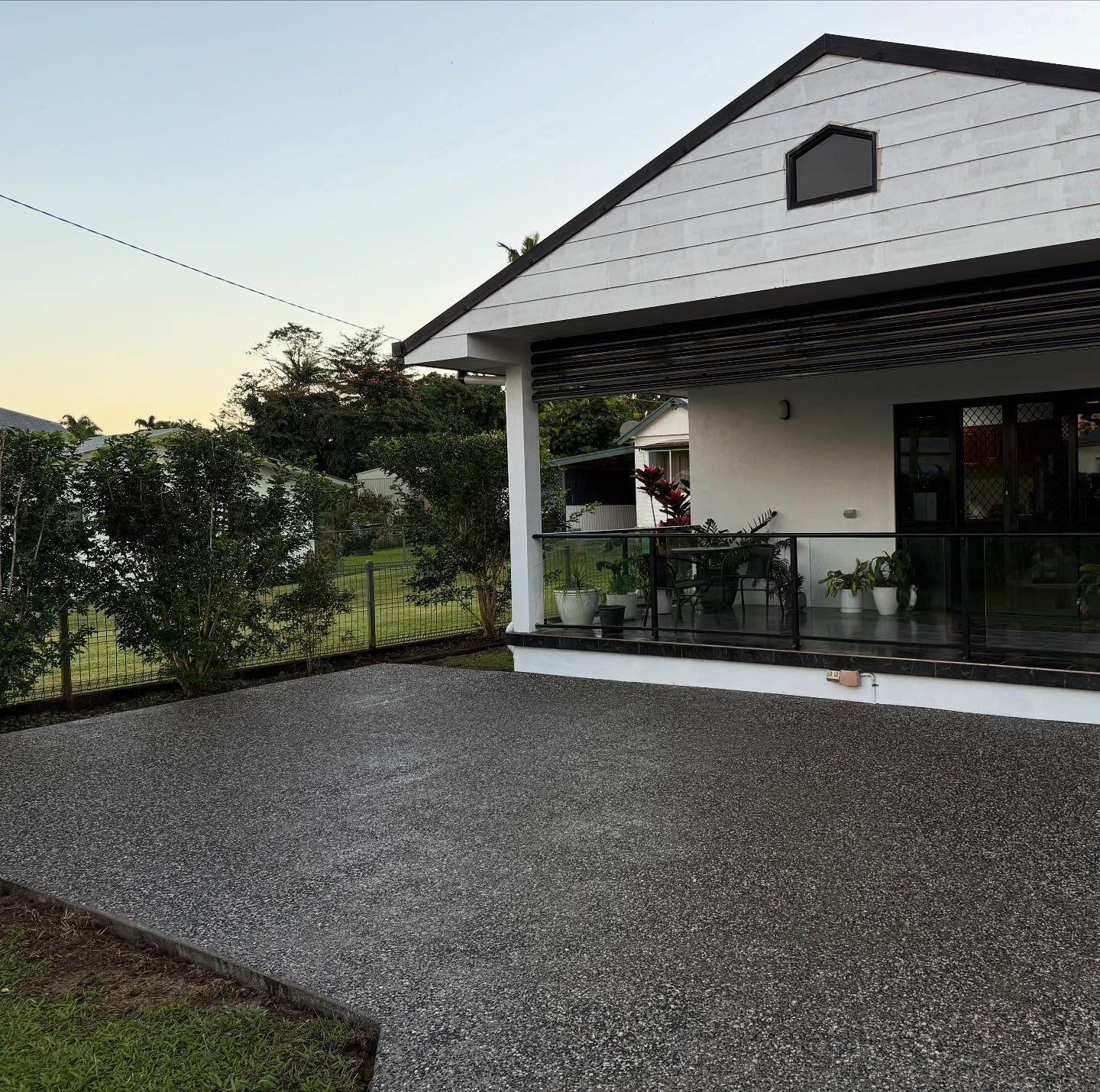 A White House With a Dark Roof — Value Concreting In Innisfail, QLD
