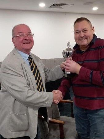 David Owens, League Vice-President, presents the inaugural David Owens Committee Trophy to Richard Knight, Captain of Streatham Vale Sports and Social Club.