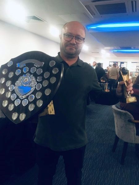 Gary Owens of the Smeta Club, Captain of the St. Matthew’s All Starz team, shows off the Governors’ Shield.