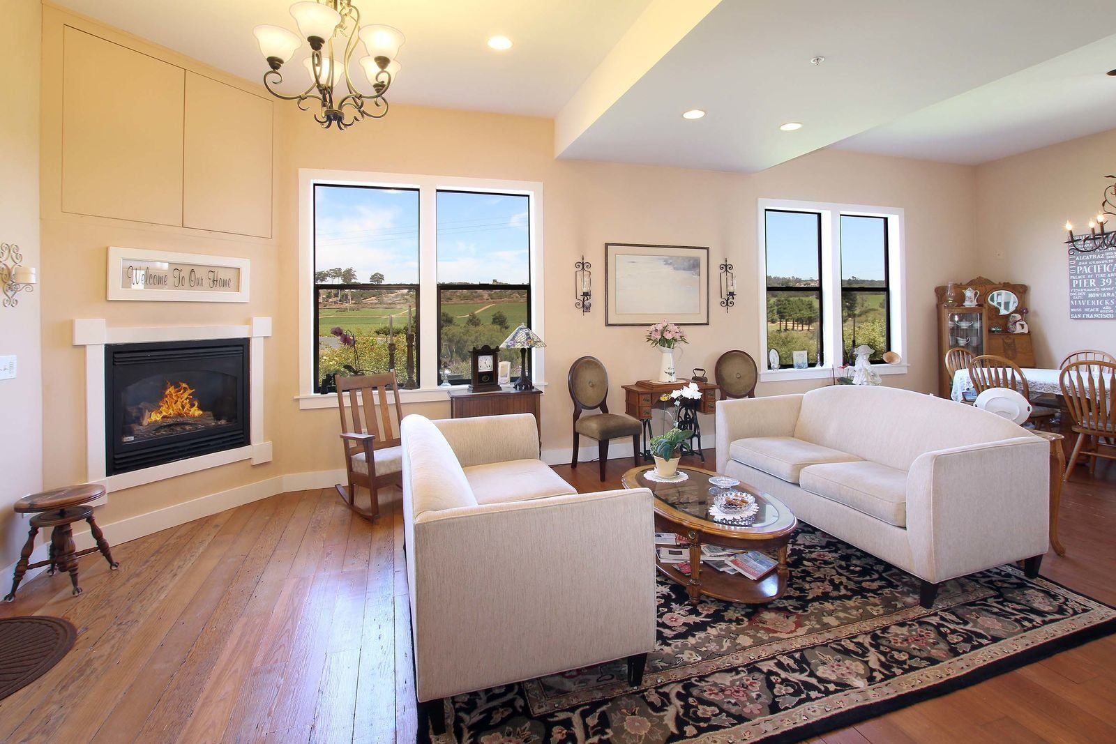 A living room filled with furniture and a fireplace