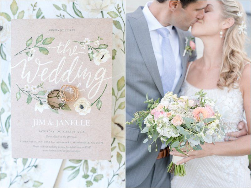 A bride and groom kissing next to a wedding invitation