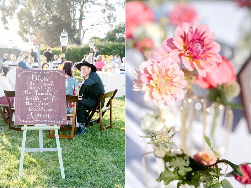 A man in a hat is sitting in a chair in the grass next to a sign that says dear family.