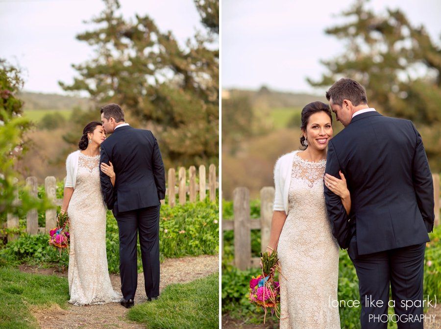 A bride and groom are posing for a picture on their wedding day.