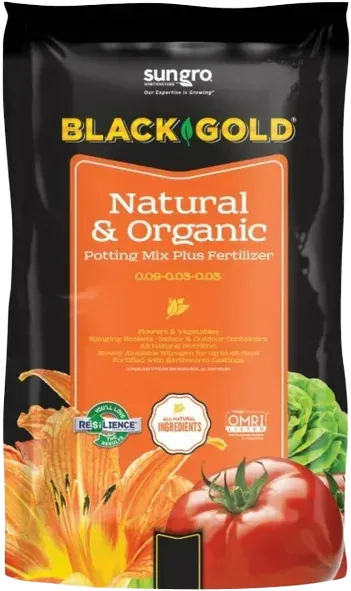 Black Gold Natural & Organic potting mix bag with orange and black design, showcasing flowers and a tomato.