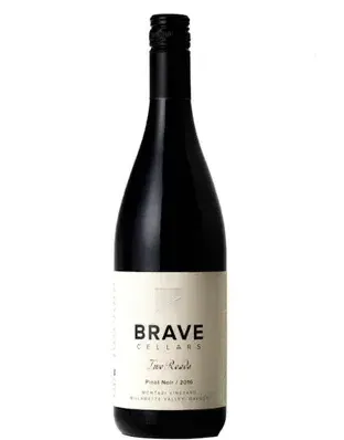 Bottle of Brave Cellars Two Roads Pinot Noir 2016 with a white label on a black bottle against a white background.