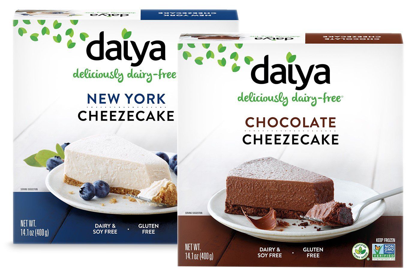 Two Daiya dairy-free cheesecake boxes: New York flavor (blue) and Chocolate flavor (brown), with images of the respective cheesecakes.