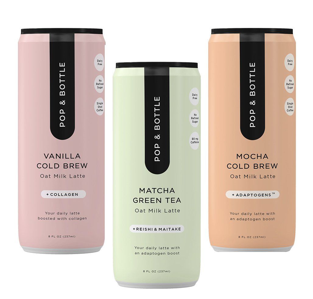 Three cans of Pop & Bottle beverages: vanilla cold brew (pink), matcha green tea (green), and mocha cold brew (peach).