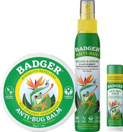 Three green Badger Anti-Bug insect repellent products: a balm, spray, and stick. The packaging features a frog and bird of paradise.