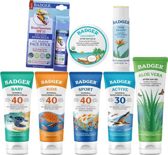Collection of Badger brand sunscreens and skincare products in various containers with labels.