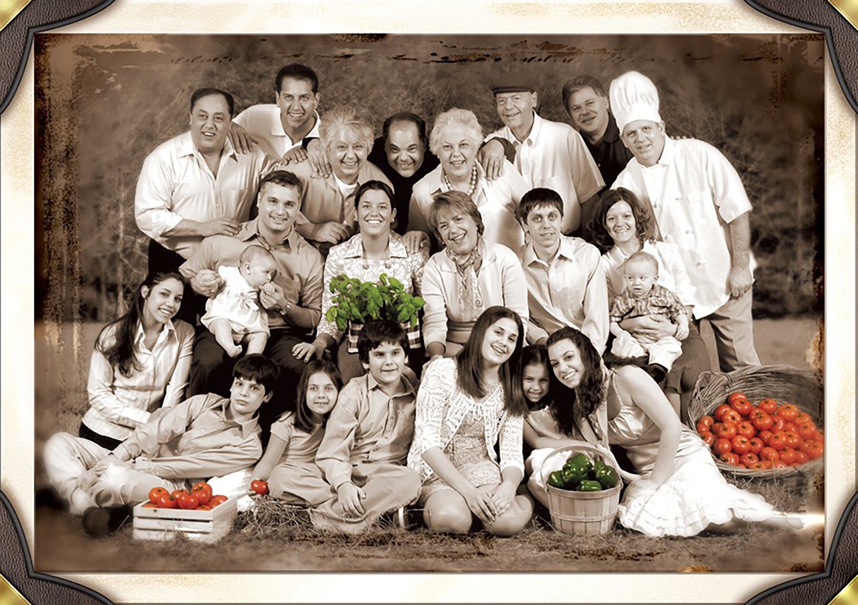 Large family posing outdoors, some holding produce. Sepia-toned photo with various ages; a chef in the back.