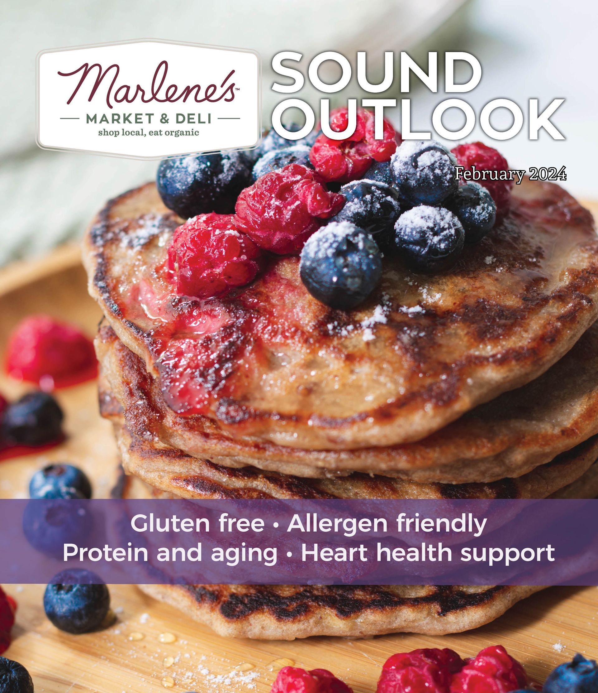 Stack of pancakes topped with berries, 