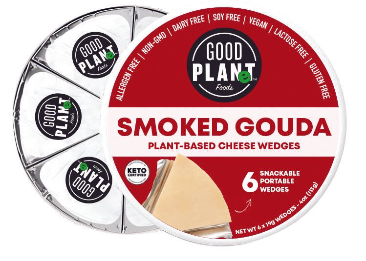 A package of Good Plant Foods Smoked Gouda plant-based cheese wedges. The package is circular and red, with six individually wrapped wedges visible.