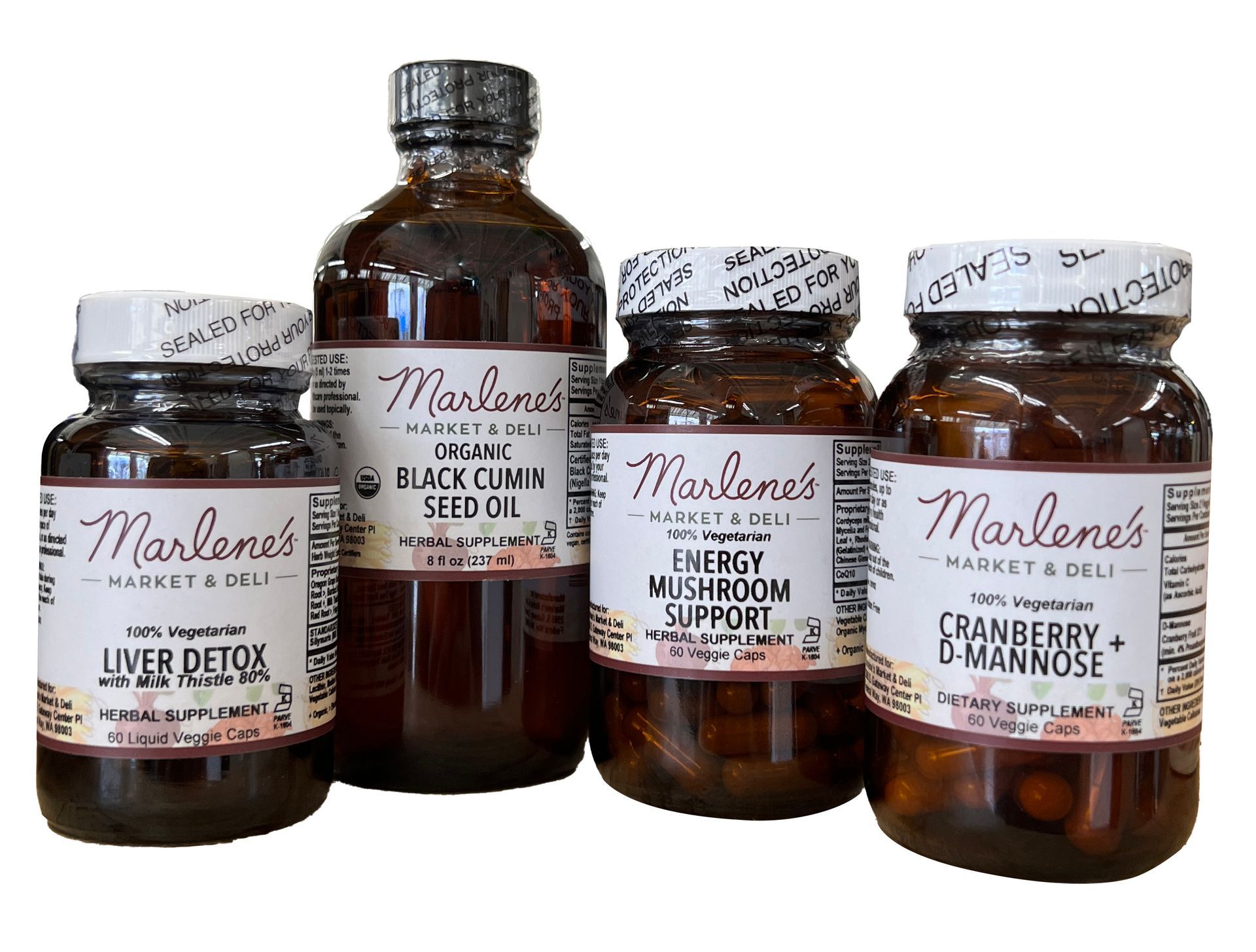 Four bottles of supplements from Marlene's Market & Deli: Liver Detox, Black Cumin Seed Oil, Energy Mushroom Suppor, and Cranberry + Mannose.