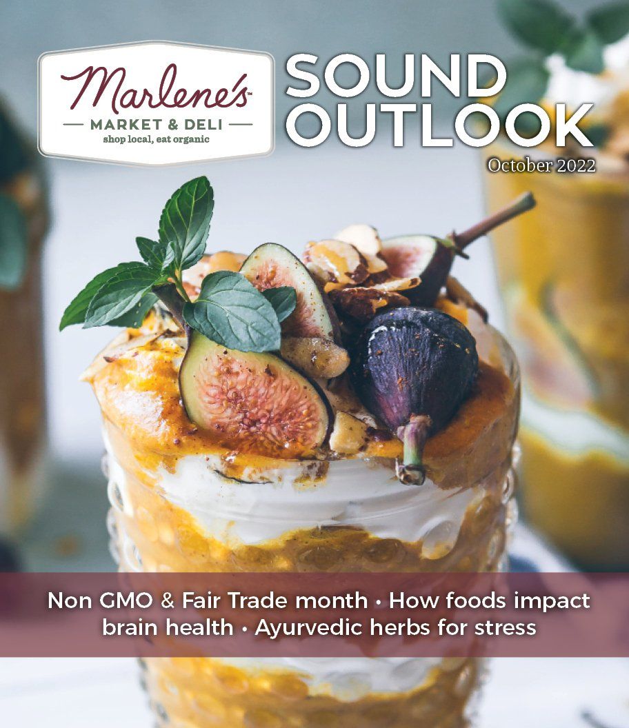 Marlene's Market & Deli magazine cover: food with figs, and text about non-GMO, brain health, and herbs.