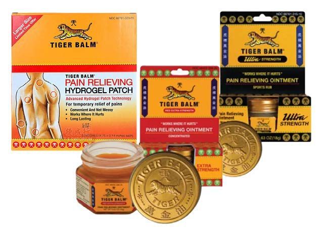Tiger Balm pain relief products: patches and ointments in various containers, featuring the brand's logo and packaging.