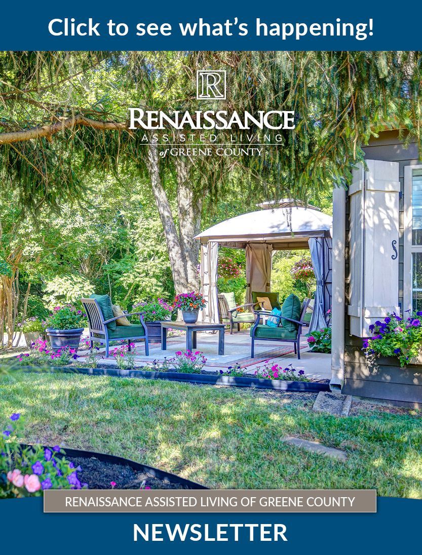 A renaissance sign is in front of a house