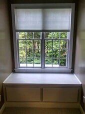 Window Grill Installation — Windows with Cabinet Beside in Creedmoor, NC