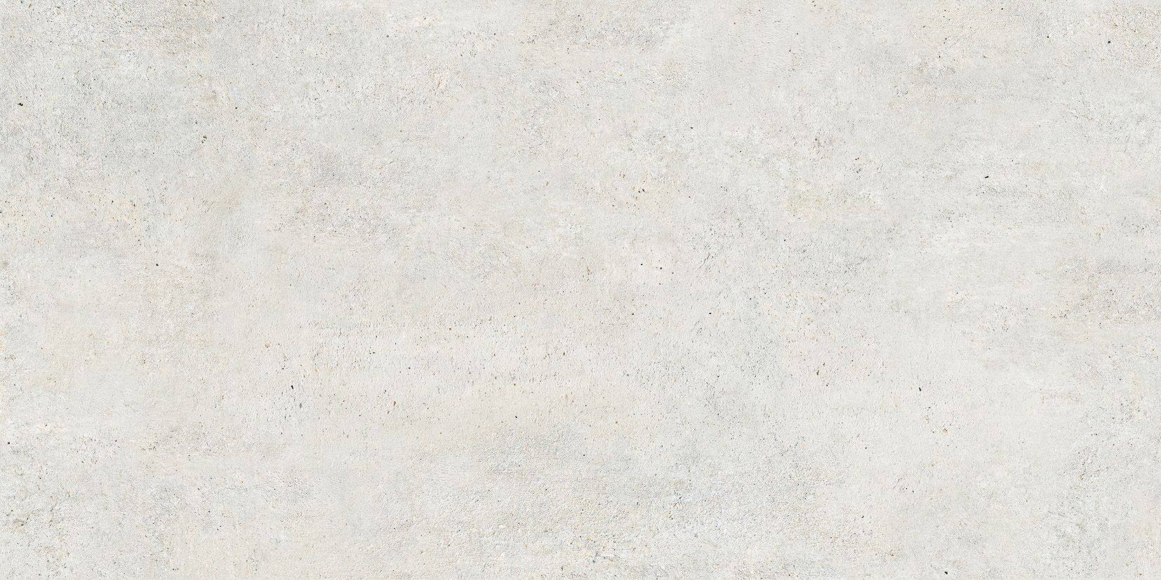 Superficie blanca texturizada con pequeñas motas de color.