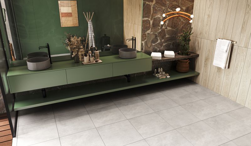 Azulejo cuadrado texturizado de color gris.