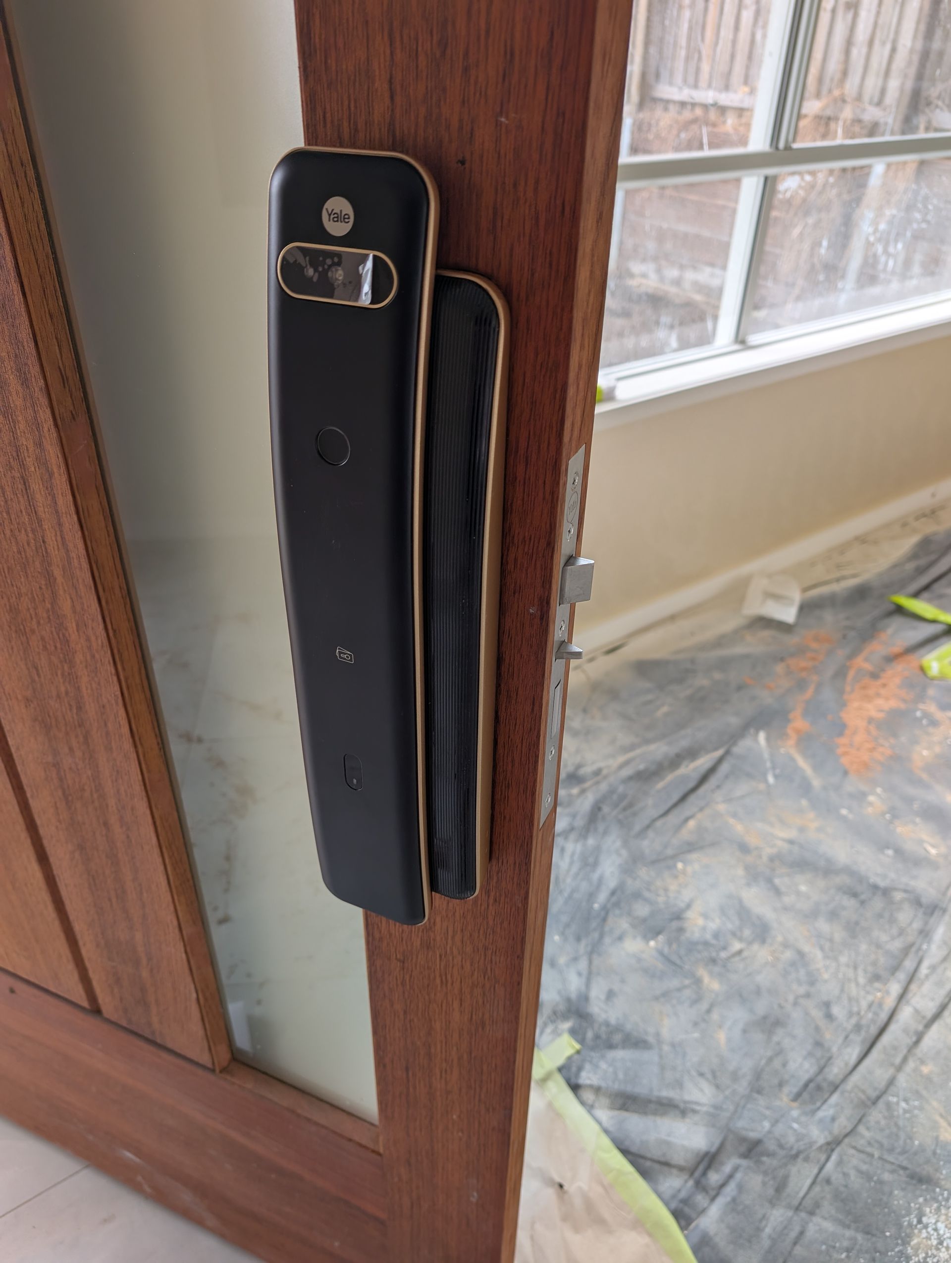 A Sleek Black Electronic Smart Lock — Above and Beyond Locksmiths in Helensvale, QLD