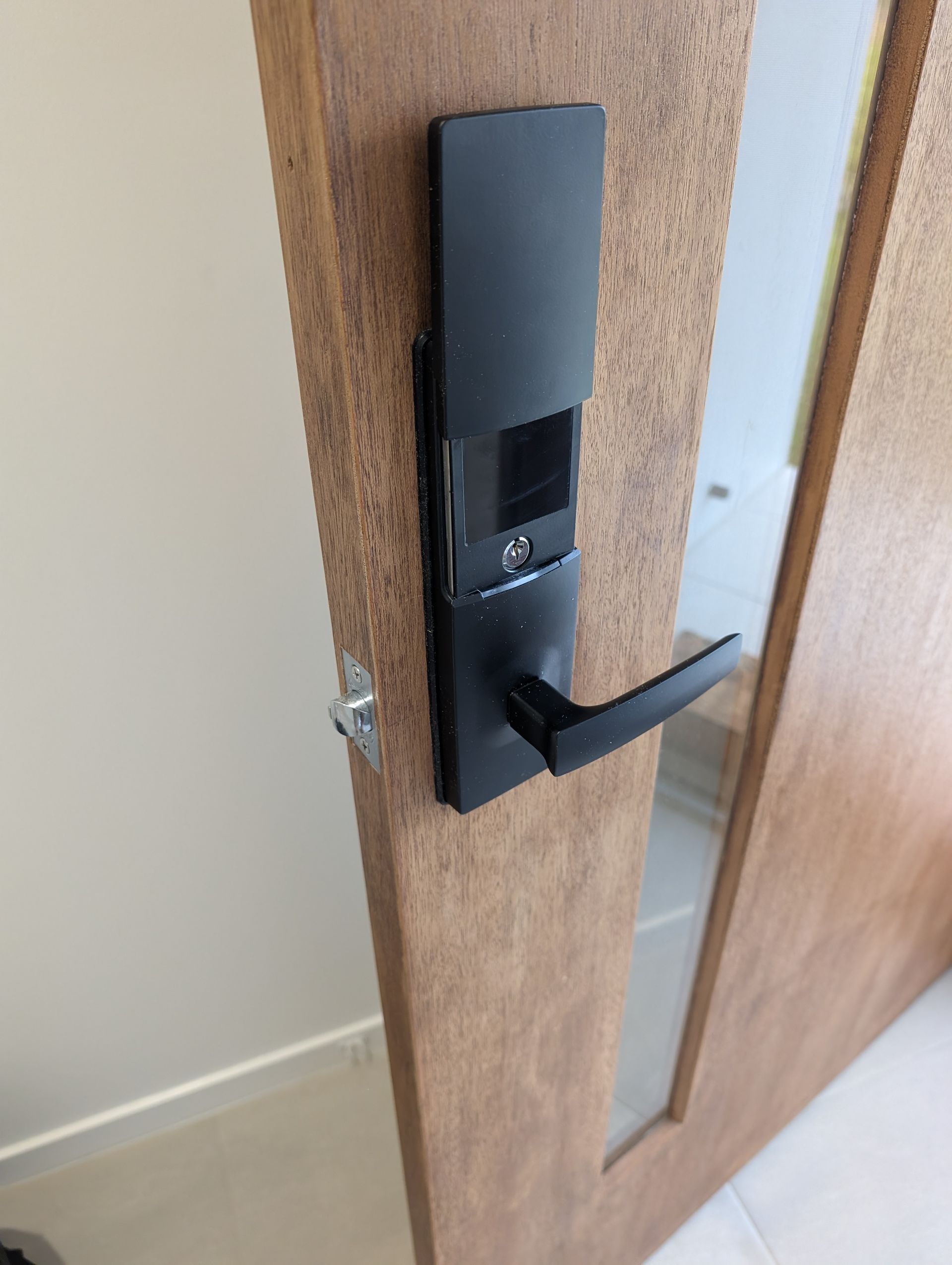 A Black Electronic Smart Door Lock — Above and Beyond Locksmiths in Pimpama, QLD
