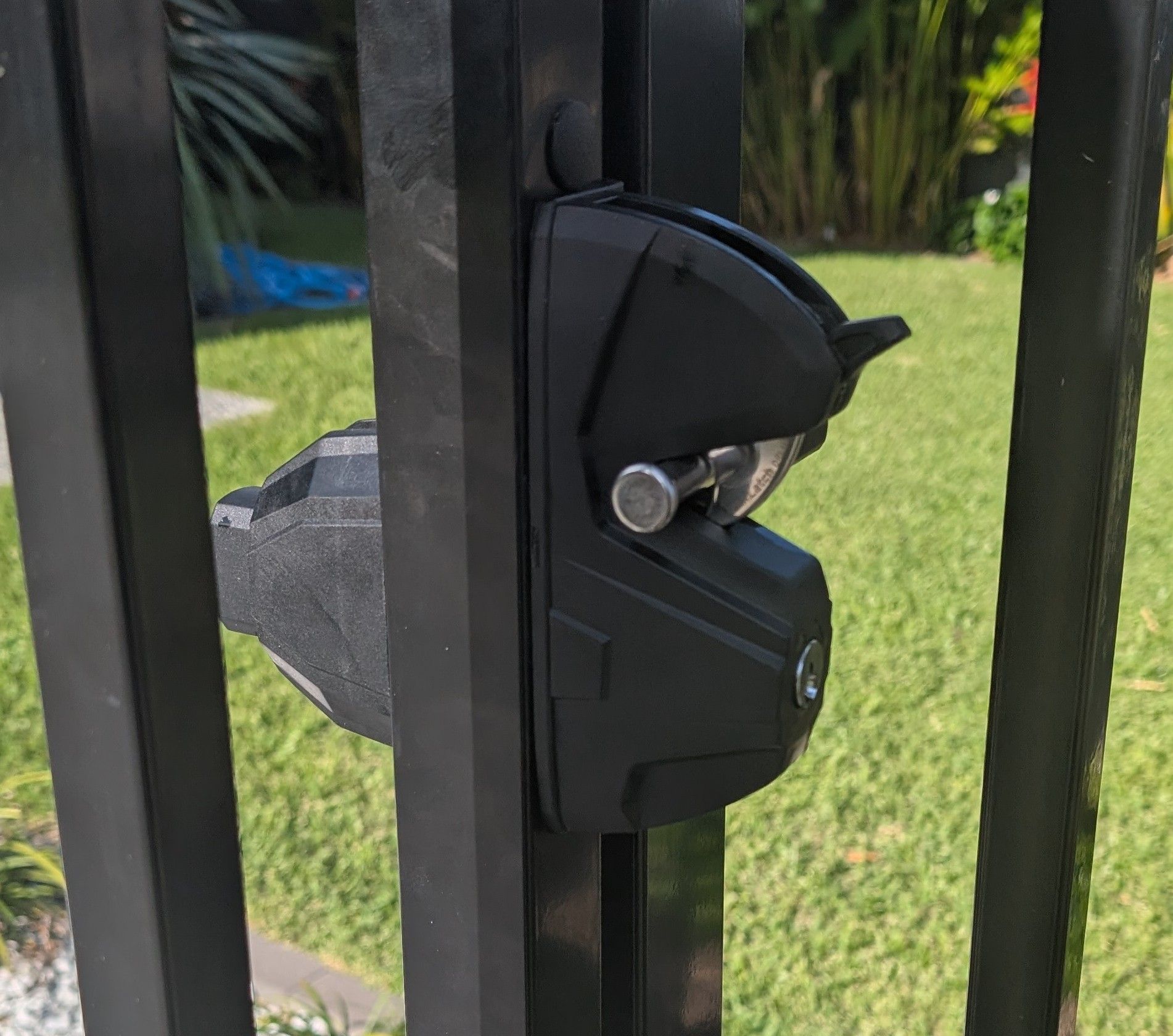 A Black, Modern, Keyed Pool Gate Latch Mounted — Above and Beyond Locksmiths in Hope Island, QLD