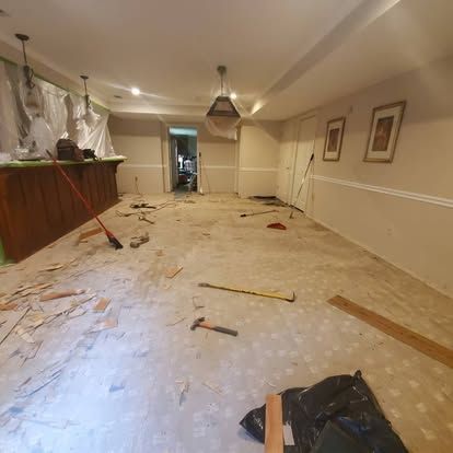 A large room with a lot of tools on the floor.