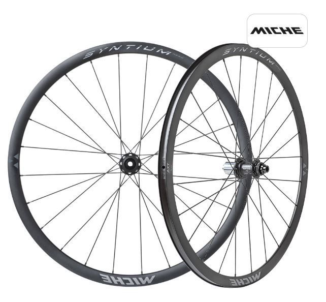 Syntium Aero Wheels
Please note, these are replacing the Syntium Disc WR Wheelsets.
Syntium, an iconic name in the Miche range that is synonymous with high-performance aluminium wheel.
Lightness and reliability meet aerodynamics. The Syntium DX WR becomes Aero thanks to the asymmetric rim with a height that increases from 25 to 29 mm and a design that is optimised based on the experience gathered from the studies used for the top-end models. The WR series hubs feature a CNC-machined hub body and rotor in Ergal 7075 T6 and are mounted with double-thickness aero spokes.
Rim
Rim 19C section with asymmetric profile 29mm, Tubeless Ready, with sandblast surface treatment and 16+8 spokes pattern that guarantees the best stiffness and reactivity of the wheel. Available as optional a tubeless kit assembled and guaranteed by QC Miche.
Hub
Hub body made of AL 7075 T6, CNC-lightened, with innovative design and 16+8 pattern for better torsional rigidity and responsiveness of the wheel. Adjustment of the front and rear hub smoothness through a special ring nut. To fix the brake disc rotor use only a lockring for the thru axle with a 27 mm hole.
These wheels are covered by a Crash Replacement Scheme offered by Chicken Cyclekit. Please see our Crash Replacement T&C's for details.
Weight: 1746g
Tech Specs:
Rims
Rims: Aluminium - Asymmetrical Axy
Rim Fitment: Clincher and Tubeless
Rim Profile Height: F 29mm - R 29mm
Rim Inner Width: 19mm
Rim Dimension: 622-19c
Hubs
Velo fixers
 Covering Halesowen, Stourbridge, Hagley, Harborne, Oldbury, Wolverhampton and surrounding areas.
Please get in touch to see if i cover your area.
Call us: 07985 703973    
Ride safe everyone !!
