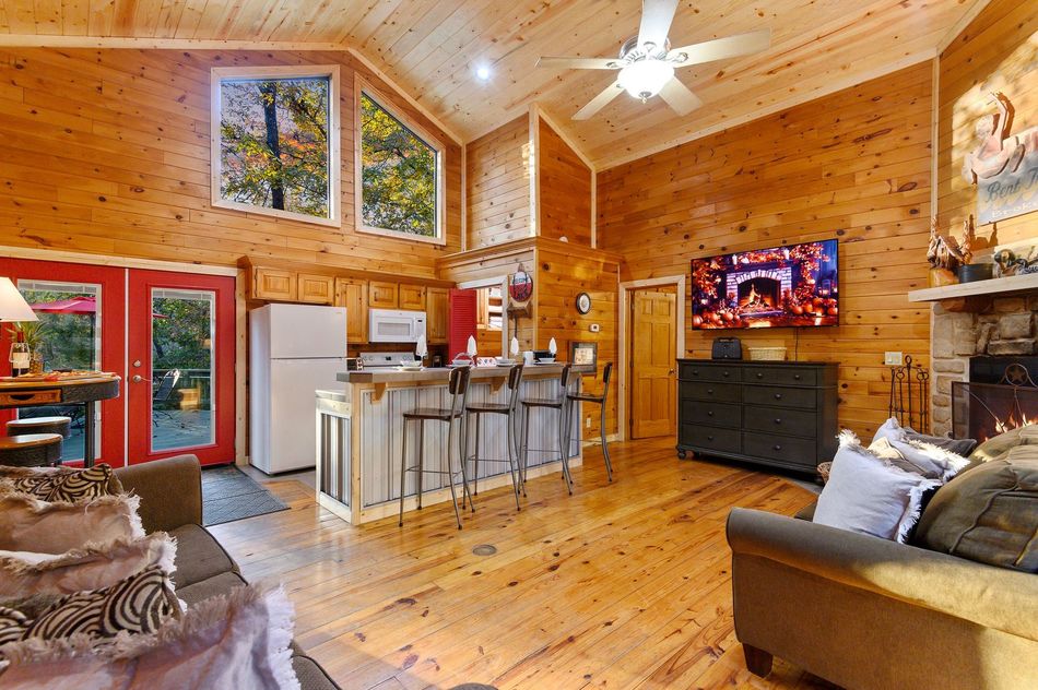 A living room filled with furniture and a flat screen tv.