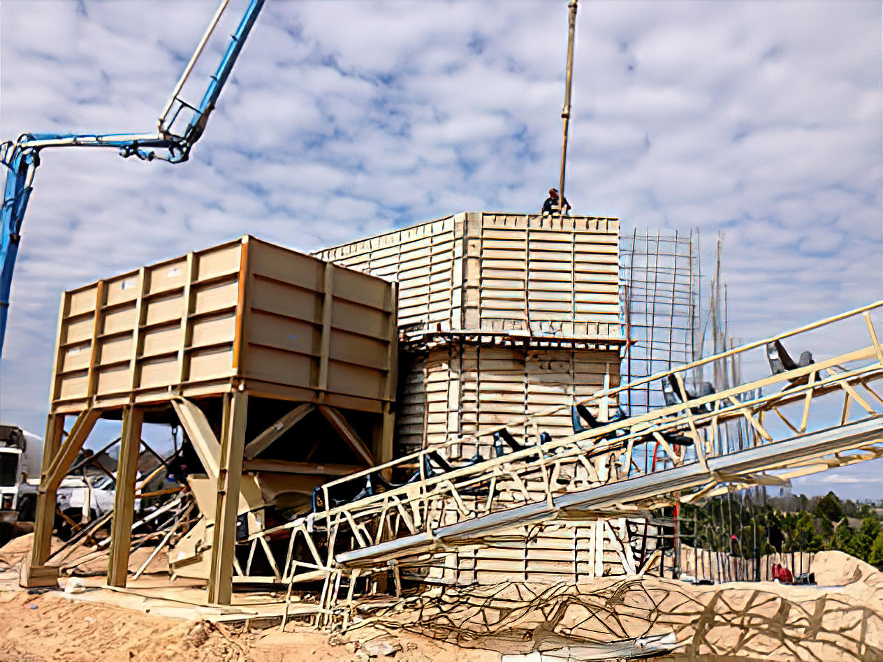 A construction site with a conveyor belt and a crane.