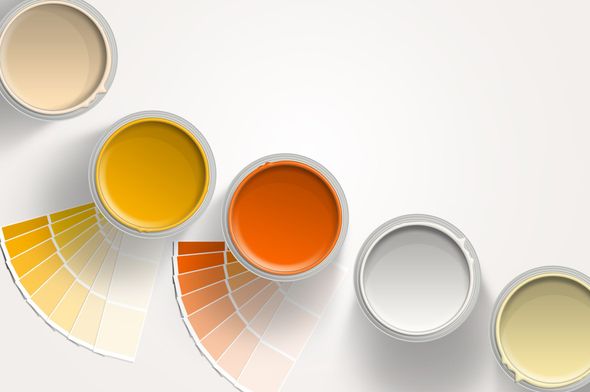 Interior Latex — Five Paint Cans Of Yellow, Orange And White Paint in Houston, TX