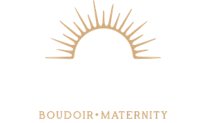 A logo for a photography studio with three trees in the background.