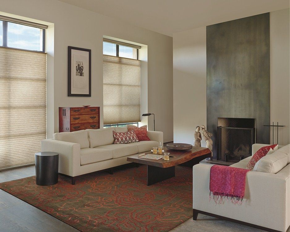 A living room with a couch and a fireplace