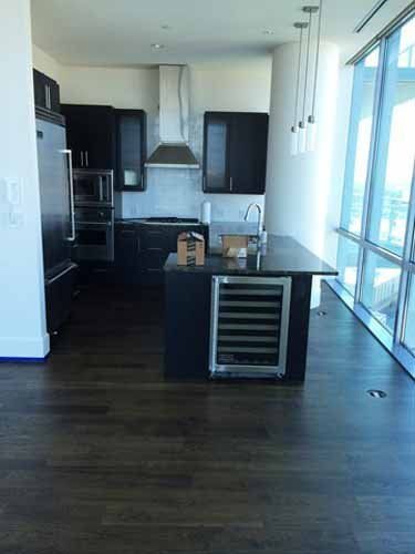 Refinishing Floors ─ Hardwood Floor in Kitchen Area in Fort Worth, TX