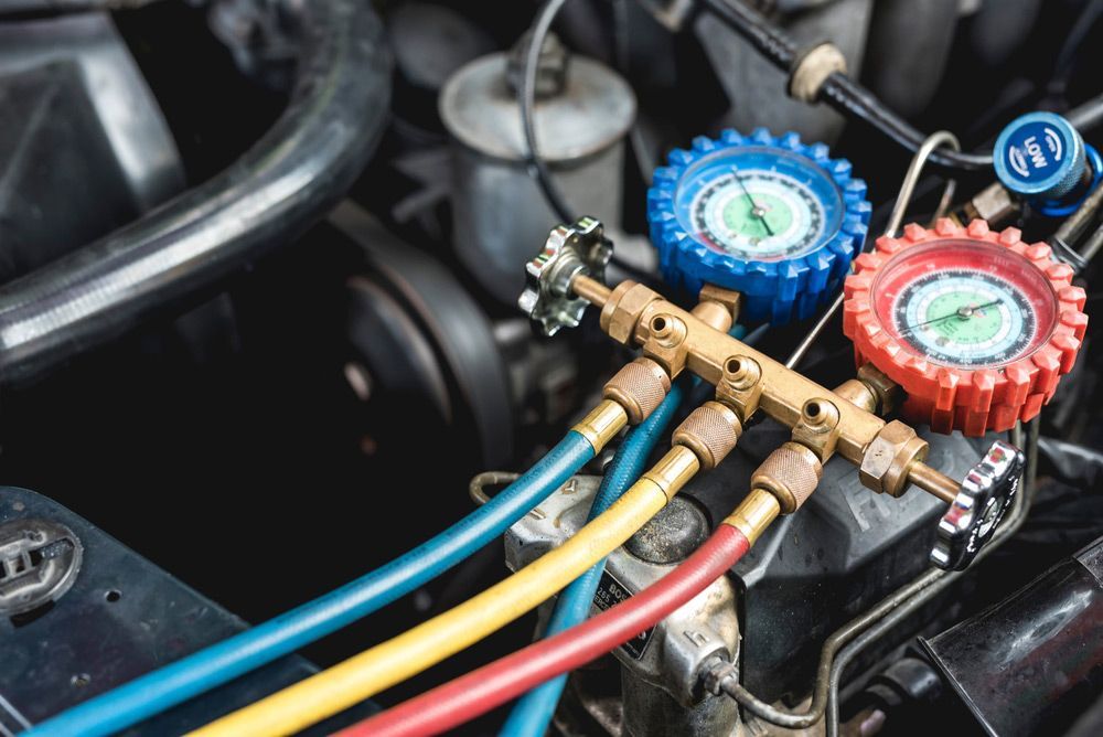 Recharging The Car Air Conditioner With Refrigerant — Autocool Air Conditioning in Tea Gardens, NSW