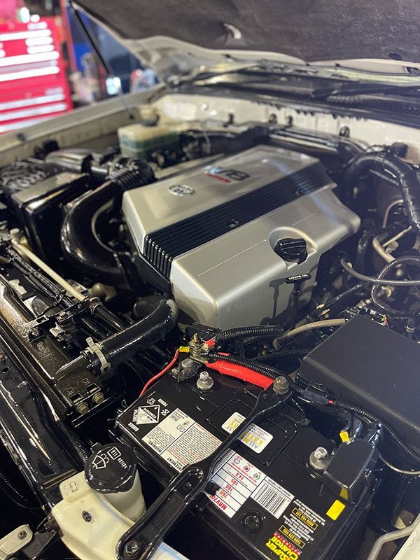 A Close Up Of The Engine Of A Car With The Hood Open — Autocool Air Conditioning in Raymond Terrace, NSW