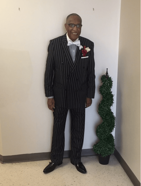 Man Wearing Coat With Stripes Pattern — Tarrant, AL — Lily Baptist Church