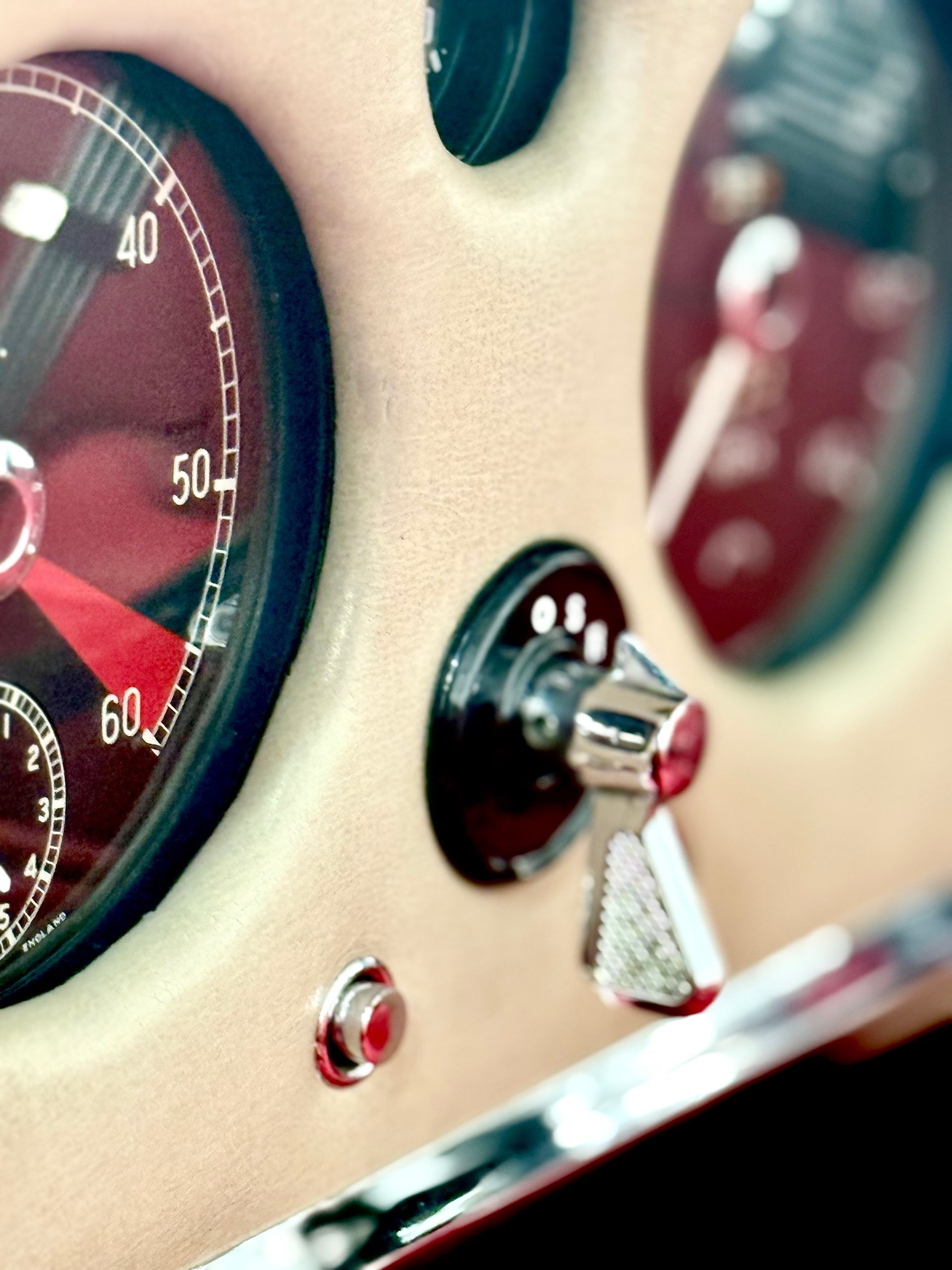 A close up of a speedometer with the number 50 on it