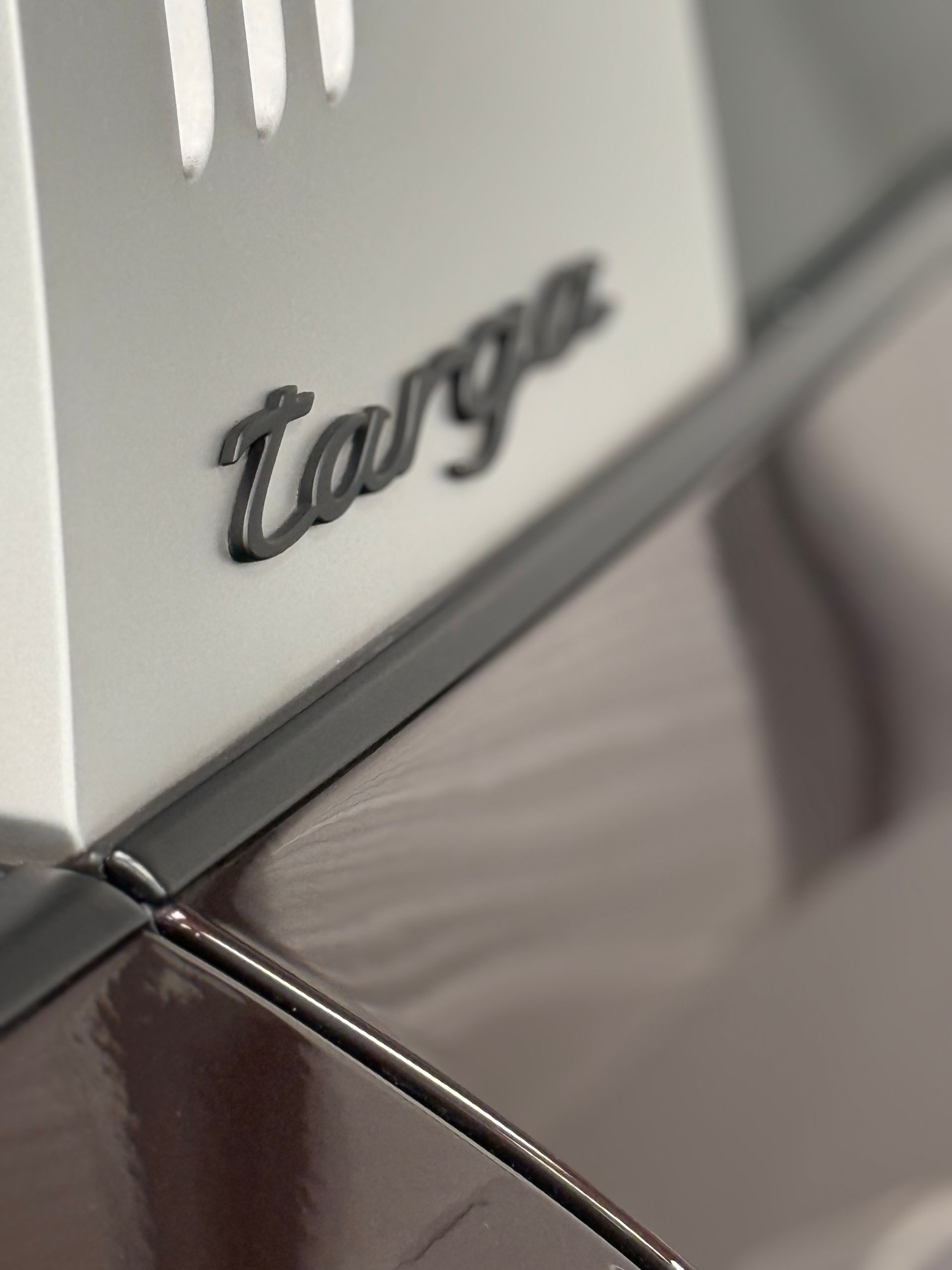 The word targa is on the side of a car