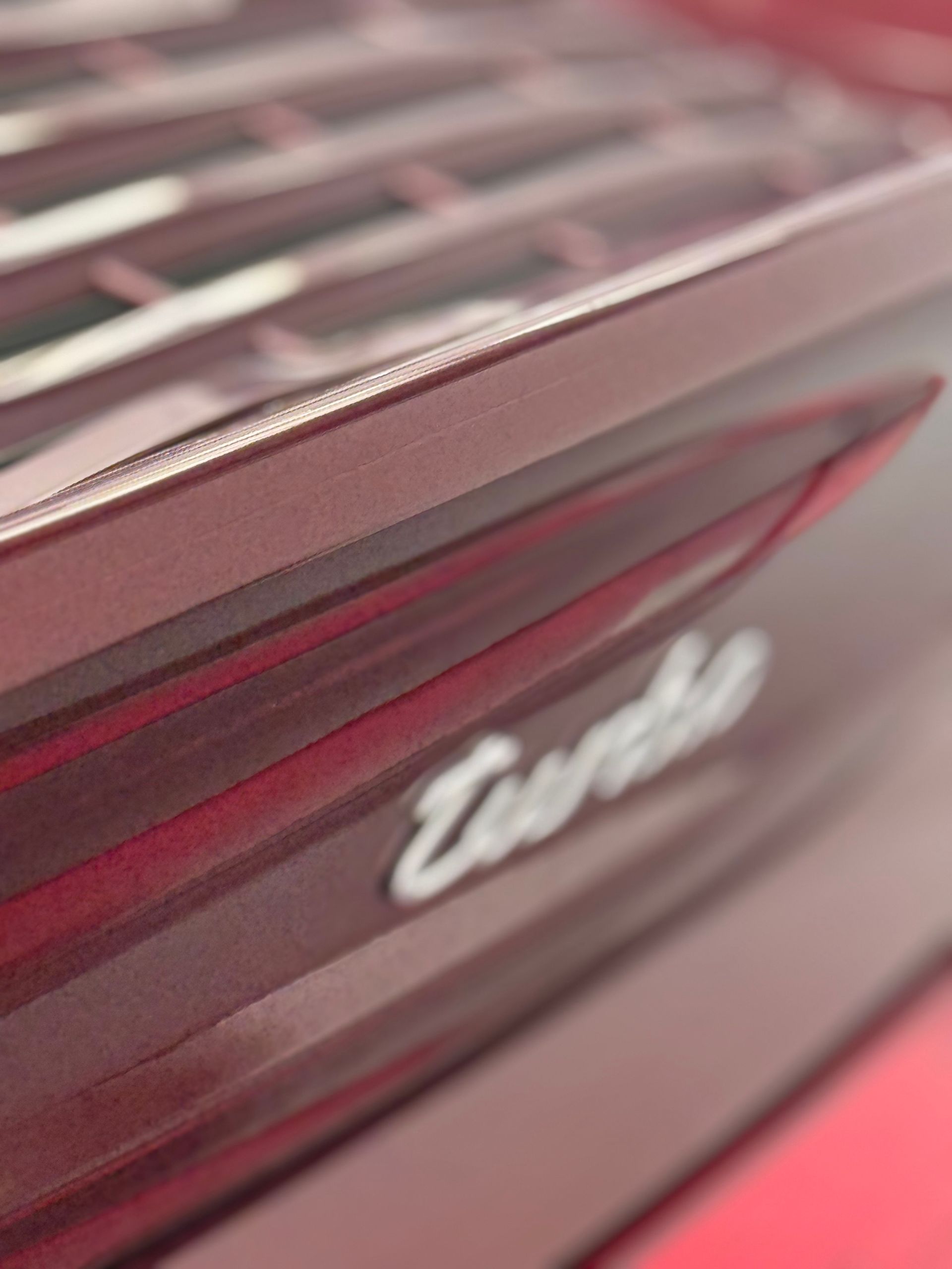 A close up of the back of a turbo car